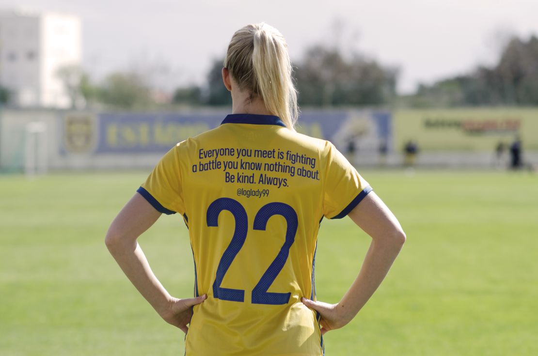 Olivia Schough models her shirt quote.