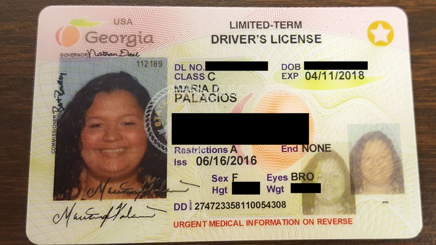 Legal resident Maria Palacios has a license that says "limited-term" for when her green card expires. If Georgia passes HB 324, residents like Palacios would also have "ineligible voter" on their licenses. 