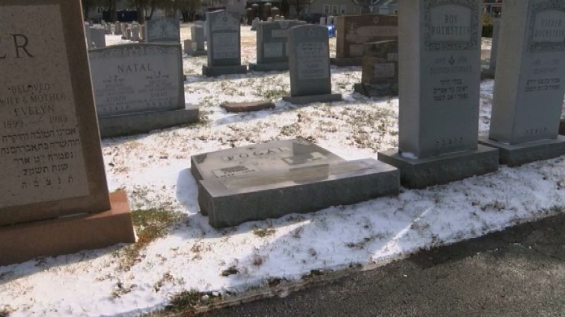 A toppled headstone at the cemetery in Rochester, New York.