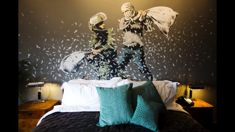 Each room is different and features a variety of artwork including this wall mural by Banksy.  According to the hotel's website, the aim of the hotel is "to tell the story of the wall from every side and give visitors the opportunity to discover it for themselves." 