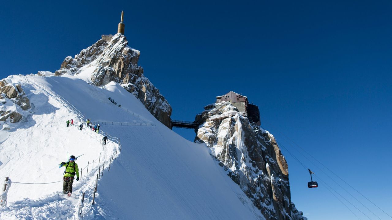 <strong>Aiguille du Midi, Chamonix, France: </strong>To reach the famous Vallee Blanche glacier, skiers walk through an ice tunnel and rope up to scramble down a knife-edge before descending 20 kilometers (12.4 miles) to Chamonix.