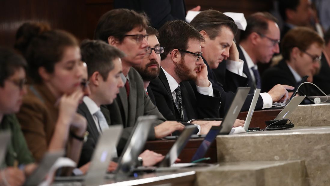 Members of the media look on as President Trump addresses a joint session of Congress on Tuesday, February 28.