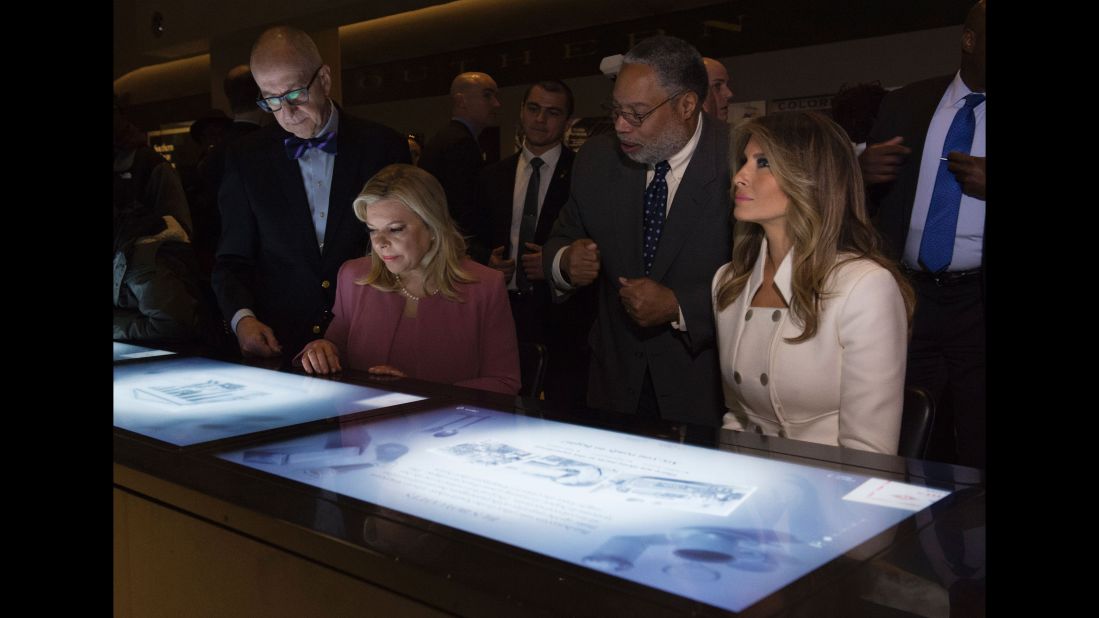 Lonnie Bunch, director of the National Museum of African American History and Culture, talks with Trump and Netanyahu as they tour the museum in Washington in February 2017.