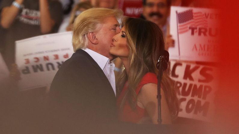 The President kisses his wife as they are introduced at <a href="index.php?page=&url=http%3A%2F%2Fwww.cnn.com%2F2017%2F02%2F18%2Fpolitics%2Fdonald-trump-florida-campaign-rally%2F" target="_blank">a rally in Melbourne, Florida,</a> in February 2017.