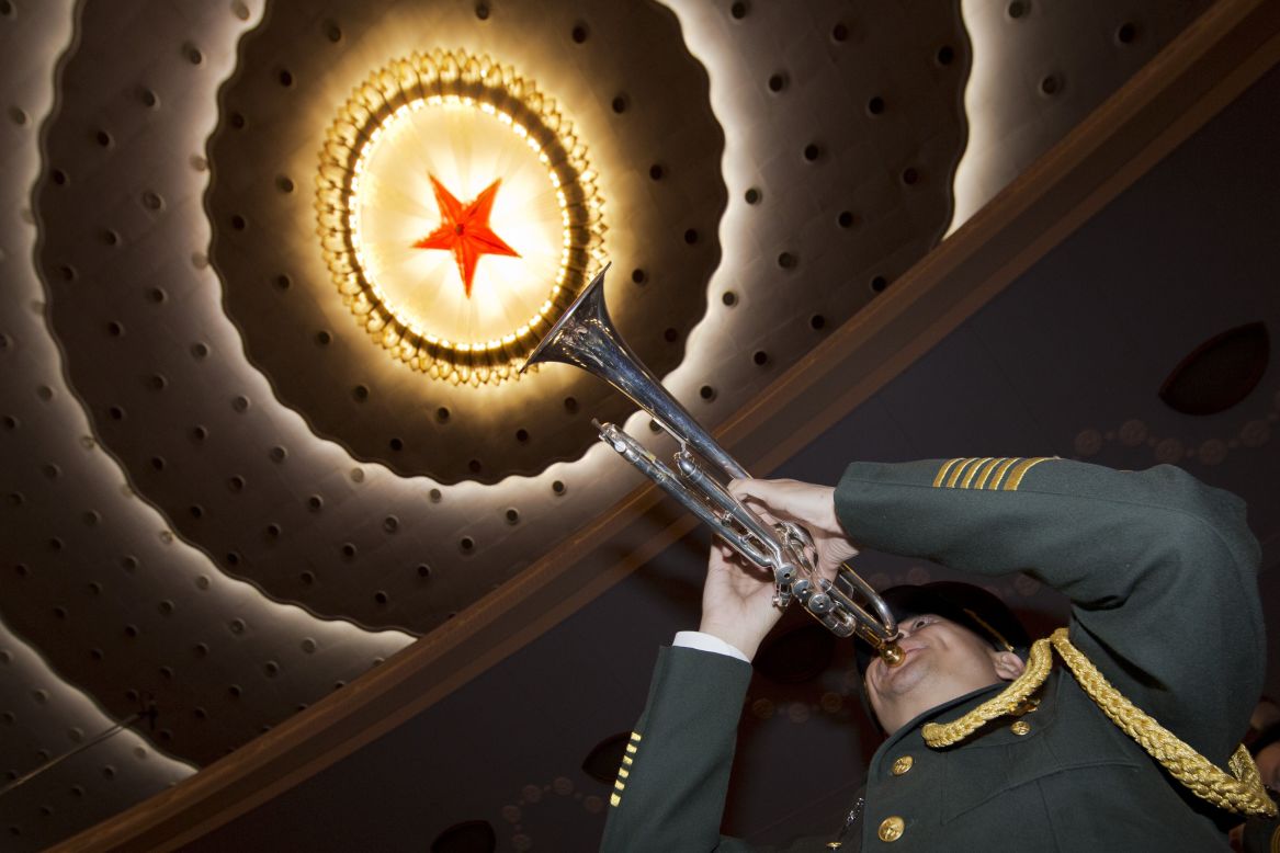 A member of a Chinese military band rehearses before the opening session of the annual National People's Congress at Beijing's Great Hall of the People, Sunday, March 5. China's top leadership as well as thousands of delegates from around the country are gathered at the Chinese capital for the annual legislature meetings.