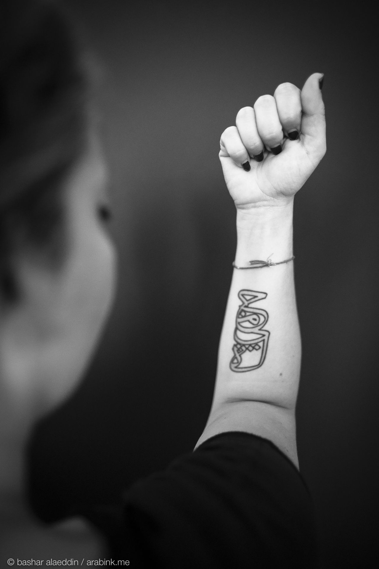 Hala Abdel Malak tattoo spells Jamileh, جميلة, her grandmother's name. It means beautiful.
