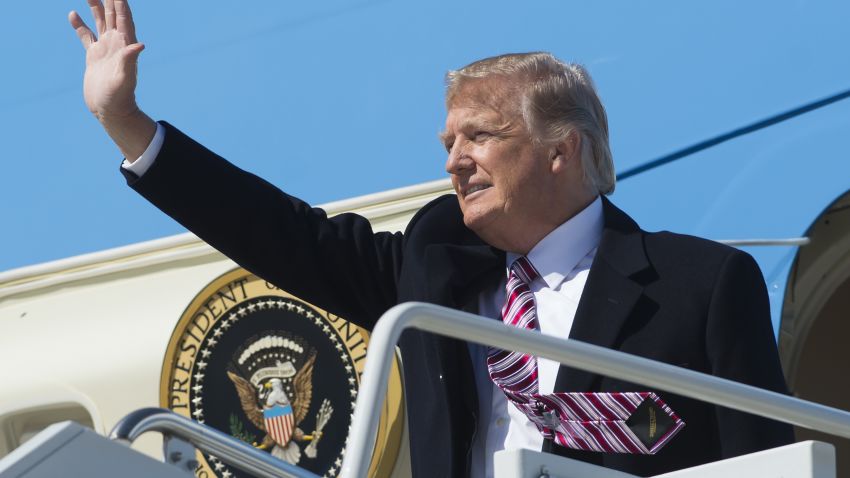US President Donald Trump waves from Air Force One upon arrival at Langley Air Force Base in Virginia, March 2, 2017, as he travels to Newport News, Virginia, to visit the pre-commissioned USS Gerald R. Ford aircraft carrier. / AFP PHOTO / SAUL LOEB        (Photo credit should read SAUL LOEB/AFP/Getty Images)
