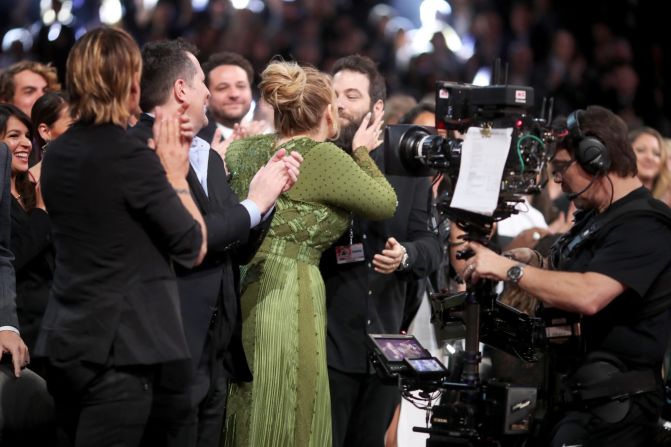 Singer Adele kisses Simon Konecki during the Grammy Awards in February 2017. <a href="index.php?page=&url=http%3A%2F%2Fwww.cnn.com%2F2017%2F03%2F05%2Fentertainment%2Fadele-confirms-marriage%2Findex.html">Adele  confirmed during a concert in Brisbane, Australia, </a>that she and Konecki are married. 