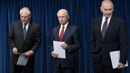 (L-R) US Secretary of State Rex Tillerson, Attorney General Jeff Sessions, and Homeland Security Secretary John Kelly arrive to deliver remarks on visa travel at the US Customs and Border Protection Press Room in the Reagan Building on March 6, 2017 in Washington, DC.
US President Donald Trump signed a revised ban on travelers from six Muslim-majority nations Monday -- one with a reduced scope so Iraqis and permanent US residents are exempt. The White House said Trump signed the order -- which temporarily freezes new visas for Syrians, Iranians, Libyans, Somalis, Yemenis and Sudanese citizens -- behind closed doors "this morning".
 / AFP PHOTO / MANDEL NGAN        (Photo credit should read MANDEL NGAN/AFP/Getty Images)
