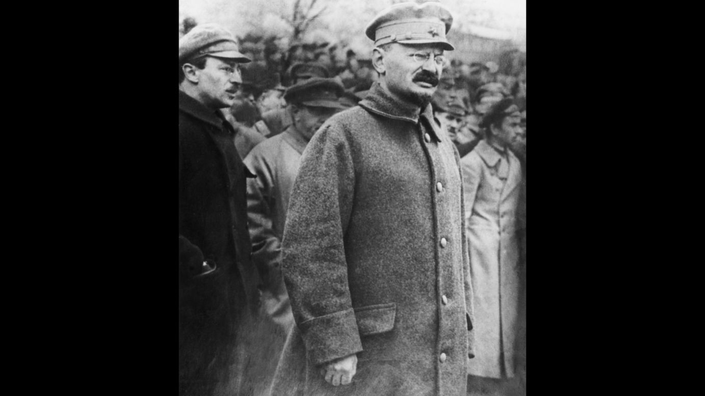Revolutionary leader Leon Trotsky walks through a crowd during the Russian Revolution.