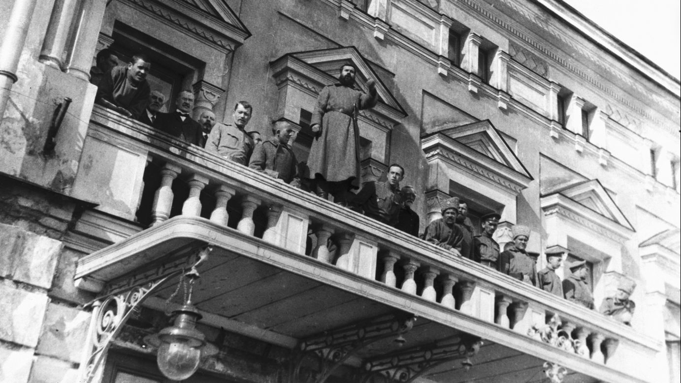 Russian revolutionists stand on the balcony of the Tsar's residence near Petrograd.