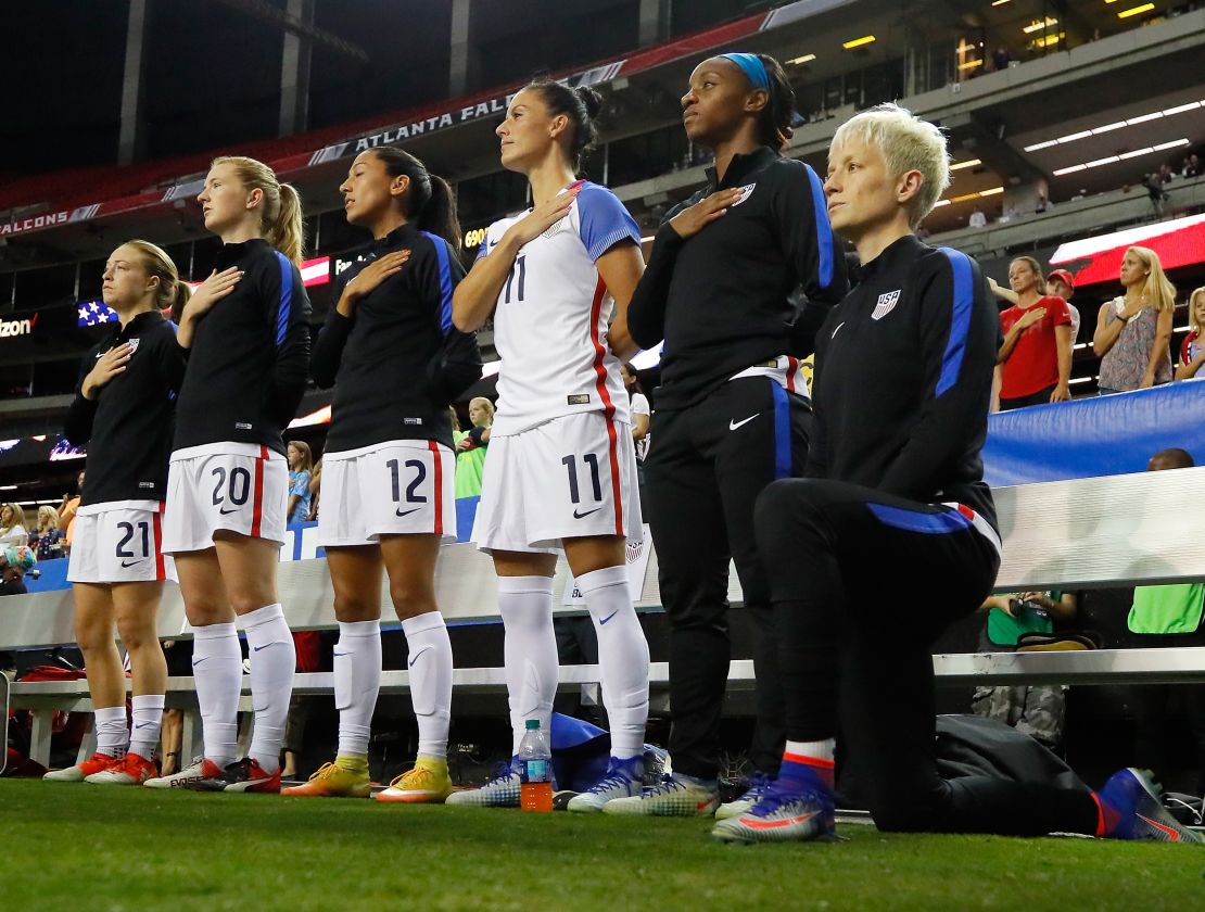 Rapinoe kneels during the US national anthem before a match against the Netherlands in September 2016.  