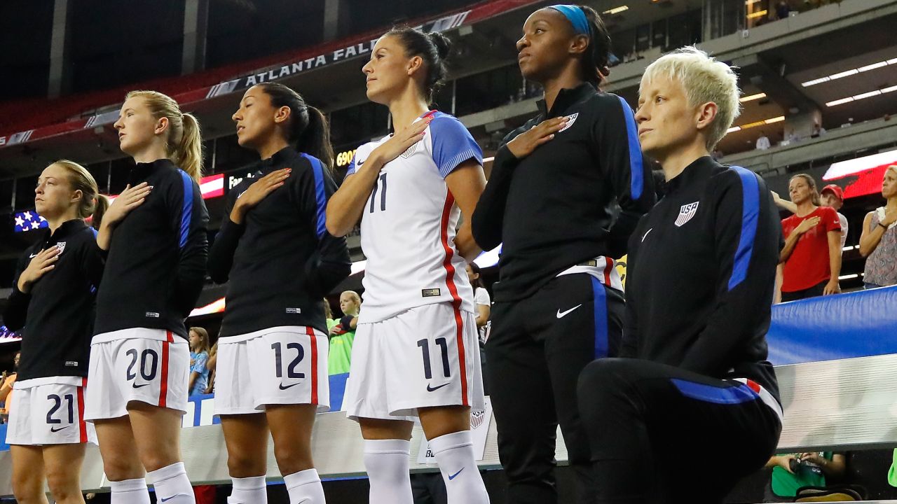 Rapinoe kneels during the US national anthem before a match against the Netherlands in September 2016.