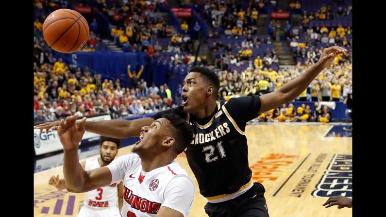 Wichita State's Darral Willis Jr. (No. 21) competes for a rebound with Illinois State's DJ Clayton during the championship game of the Missouri Valley Conference on Sunday, March 5. Wichita State won 71-51 to claim the conference's automatic spot in the NCAA Tournament.