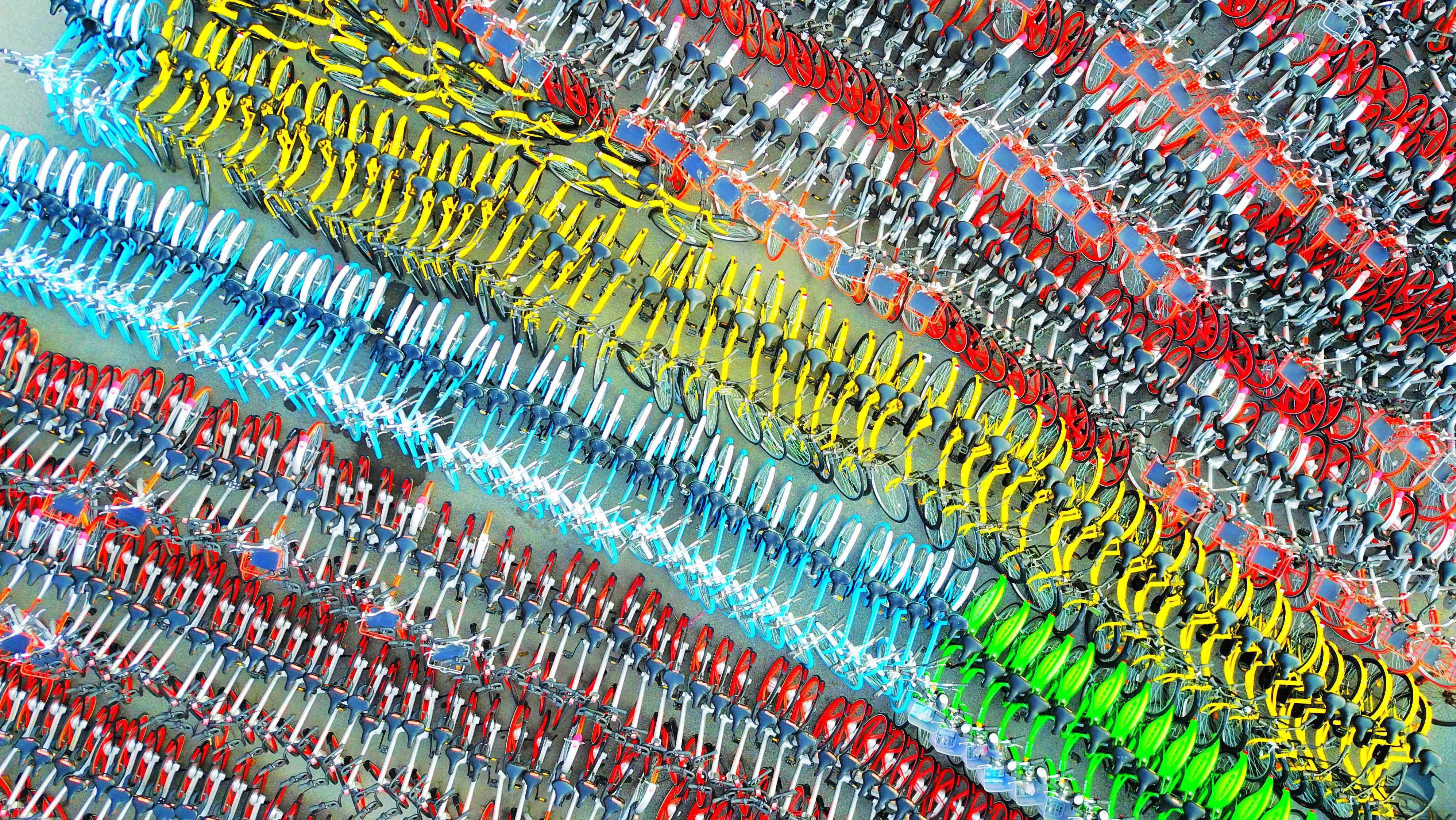 Colorful confiscated bikes are lined up at a parking lot in Shanghai, China March 1. 
