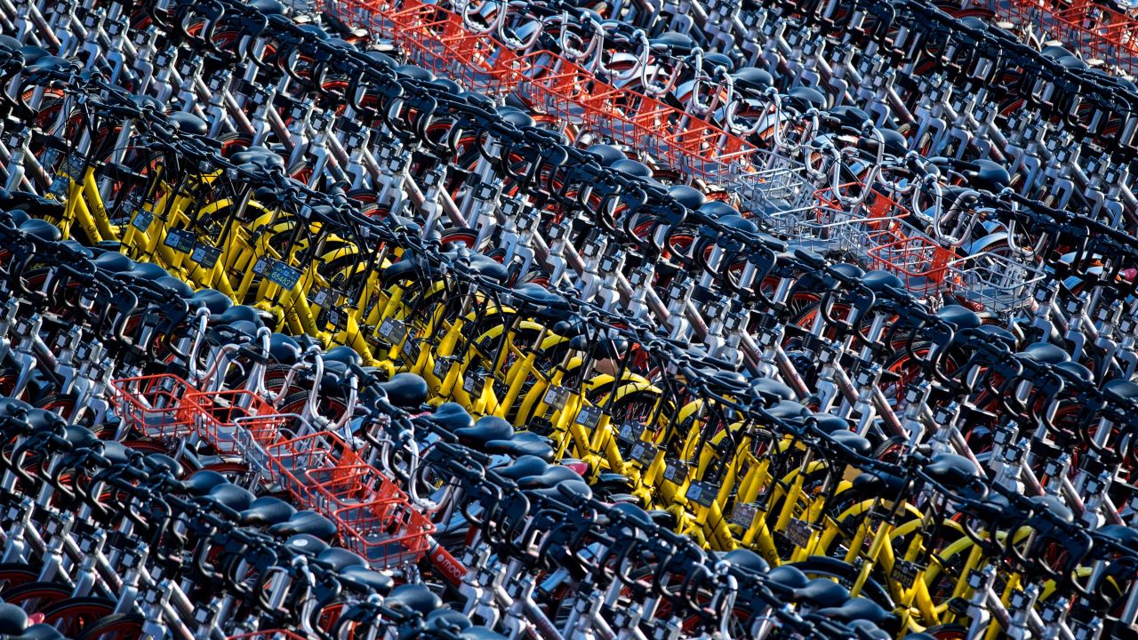 Shanghai has impounded thousands of brightly coloured bikes placed on city streets by cycle-sharing companies.
