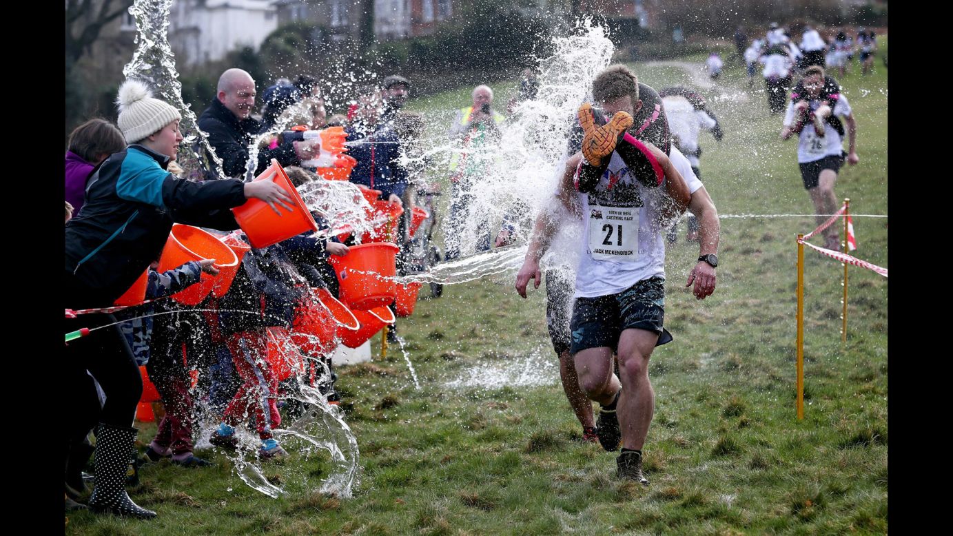 Competitors take part in the annual Wife Carrying Race in Dorking, England, on Sunday, March 5.