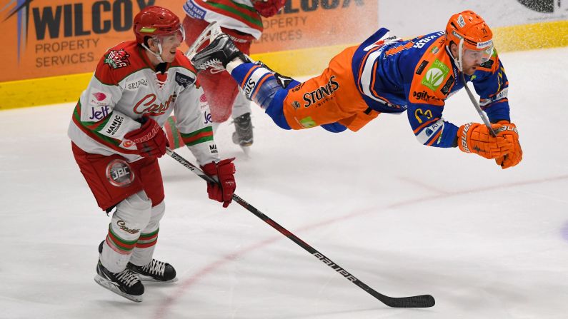 Sheffield's Geoff Walker goes airborne during the Challenge Cup final against Cardiff on Sunday, March 5. Cardiff won 3-2 on home ice. It was the second time in three seasons that the Devils won the Challenge Cup, a tournament for pro teams in the United Kingdom.