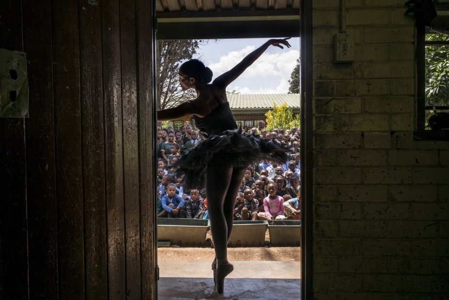 Using ballet and dance to promote healthy and positive choices, in 2014, it provided lecture demonstrations to twenty schools in Soweto, raising awareness and informing students of the available free classes they provide together with the provincial department of education.  <br /><br />Pictured: Senior soloist Kitty Phetla performs in a classroom at the Nka-Thuto Primary School in Soweto.