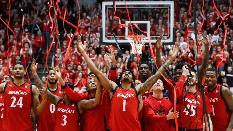 Cincinnati basketball players celebrate after winning their home finale against Houston on Thursday, March 2. <a href="index.php?page=&url=http%3A%2F%2Fwww.cnn.com%2F2017%2F02%2F27%2Fsport%2Fgallery%2Fwhat-a-shot-sports-0228%2Findex.html" target="_blank">See 36 amazing sports photos from last week</a>