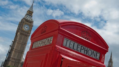 A traditional red telephone box sits beside Big Ben and The Houses of Parliament in Parliament Square in London on August 4, 2012, during London 2012 Olympic Games. AFP PHOTO / WILL OLIVER        (Photo credit should read WILL OLIVER/AFP/Getty Images)
