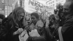 (Original Caption) Rep. Bella Abzug, (D-N.Y.), feminist Gloria Steinem and Lt. Gov. Maryann Krupsak of New York (L-R) chat with the marchers and newsmen in midtown Manhattan prior to the start of the International Women's Day March. Some 2,000 women from all walks of life joined the solidarity march in which they demanded full economic political, legal, sexual and racial equality and the right to control their own lives and bodies.