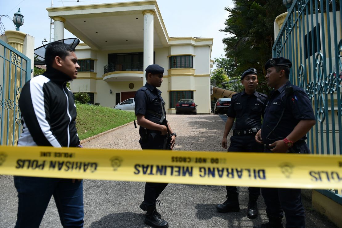 Royal Malaysia Police guard the entrance to the North Korean Embassy in Kuala Lumpur on Tuesday.