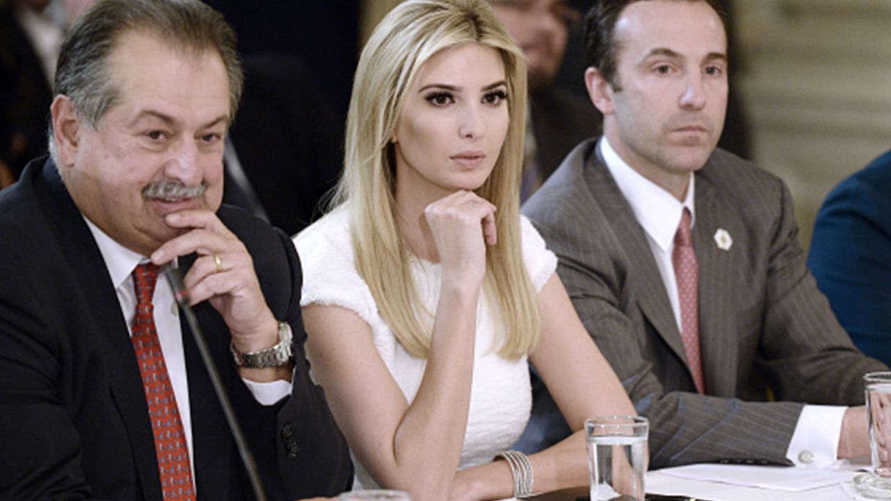 Andrew Liveris, chairman and chief executive officer of The Dow Chemical Co., from left, Ivanka Trump, and Reed Cordish, White House assistant of intragovernmental and technology initiatives, listen during a manufacturing executives meeting at the White House.