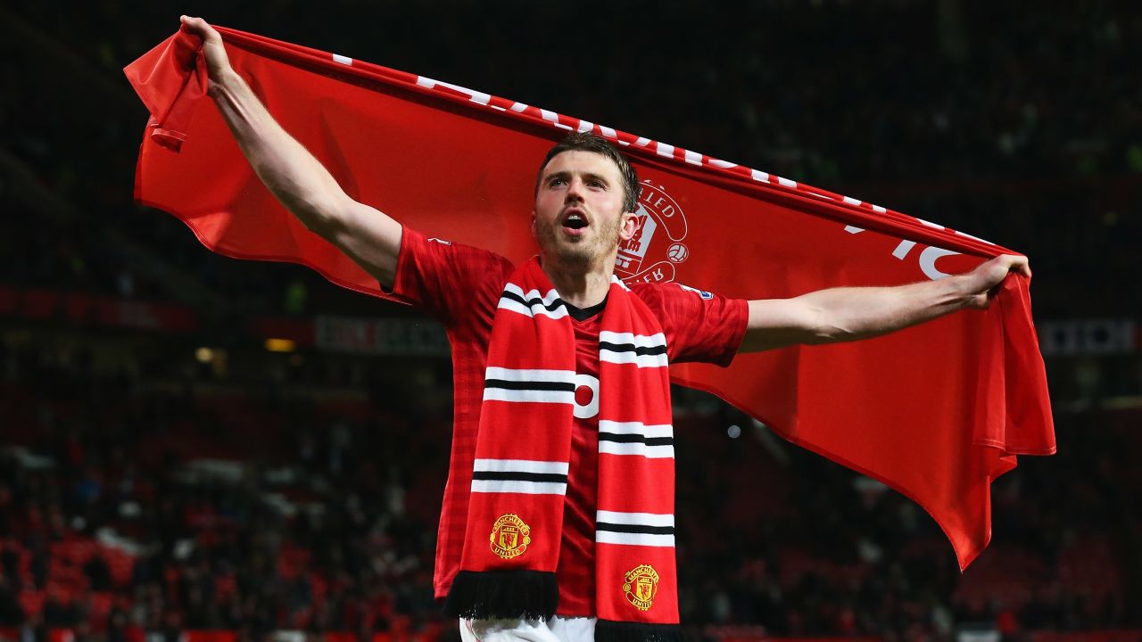 MANCHESTER, ENGLAND - APRIL 22: Michael Carrick of Manchester United celebrates victory and winning the Premier League title after the Barclays Premier League match between Manchester United and Aston Villa at Old Trafford on April 22, 2013 in Manchester, England.  (Photo by Alex Livesey/Getty Images)