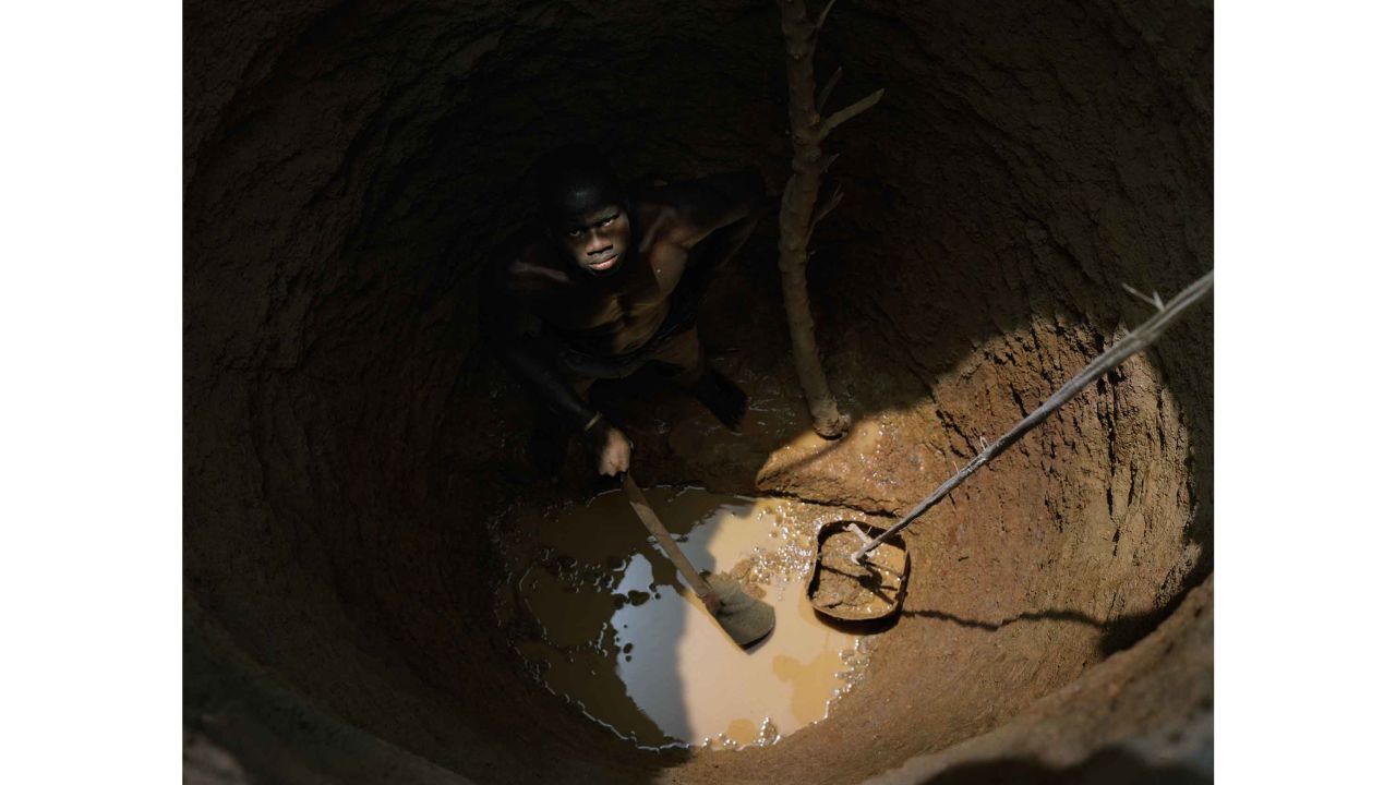 Zougmore Saidou, 21, digging a well at Gomtenga Village, Burkina Faso