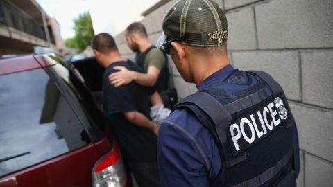 ICE agents detain a man in Los Angeles in October 2015. 