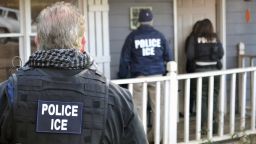In this Feb. 9, 2017, photo provided U.S. Immigration and Customs Enforcement, ICE agents at a home in Atlanta, during a targeted enforcement operation aimed at immigration fugitives, re-entrants and at-large criminal aliens. The Homeland Security Department said Feb. 13, that 680 people were arrested in roundups last week targeting immigrants living illegally in the United States. (Bryan Cox/ICE via AP)