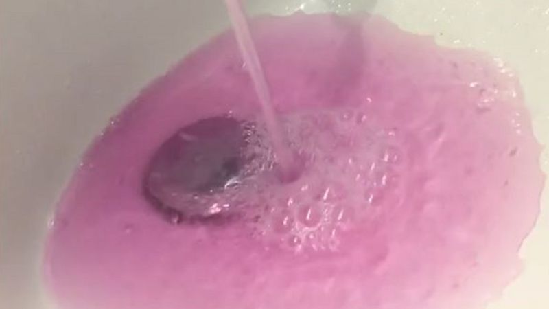 Why does my water look pink?