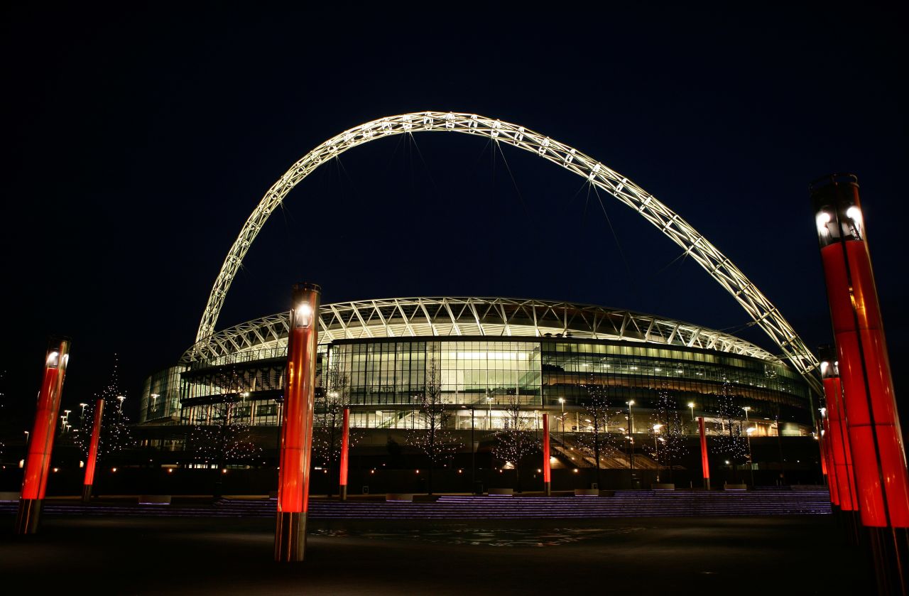 The original Wembley Stadium, with its distinctive Twin Towers, hosted the London 1948 Olympics and England's only football World Cup win, in 1966. Its replacement was designed by Foster and Partners, and features a distinctive 133-meter-high arch. It has a capacity of 90,000 and opened in West London in 2007. 