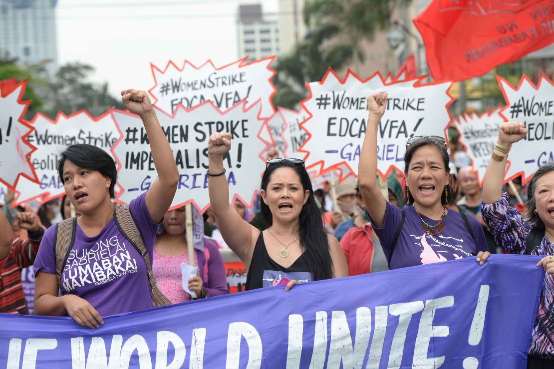 Members of women's group Gabriela march in Manila.