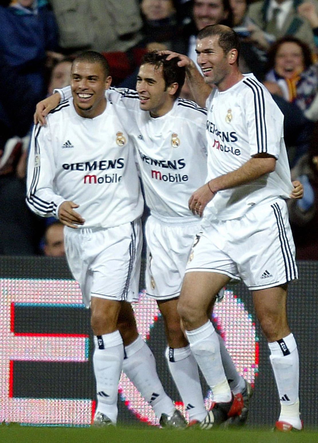 Zidane (right) and Raul (center) celebrate with Real Madrid teammate Ronaldo.