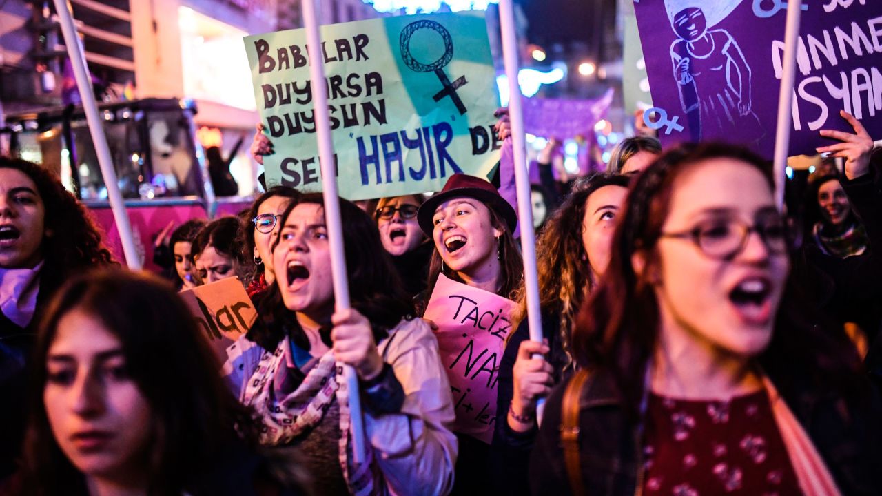 Women in Istanbul march down Istiklal Avenue.
