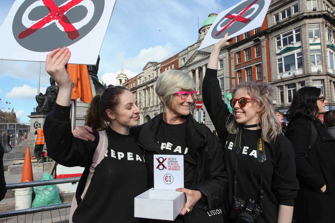 Alice Maher, 60, from Tipperary, with her god children.