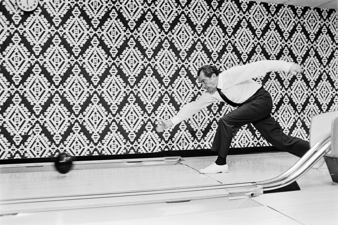 President Richard Nixon bowls with the winners of the 7th International Bowling Federation Tournament.