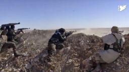 This frame grab from a video provided by the Syria Democratic Forces (SDF), shows fighters from the SDF opening fire on an Islamic State group's position, in Raqqa's eastern countryside, Syria, Monday, March 6, 2017. U.S.-backed Syrian fighters have cut the main road between the northern Syrian city of Raqqa, which is controlled by the Islamic State group, and the eastern city of Deir el-Zour, which is partially controlled by IS. The Britain-based Syrian Observatory for Human Rights says fighters from the Kurdish-led Syria Democratic Forces cut the road linking the two cities in the area of Jazra near Raqqa, the de facto capital of the IS self-declared caliphate. (Syria Democratic Forces, via AP)