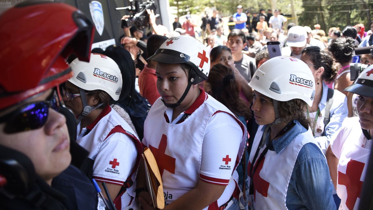 Guatemalan Red Cross members arrive at the Virgen de la Asunción Safe Home in San Jose Pinula.