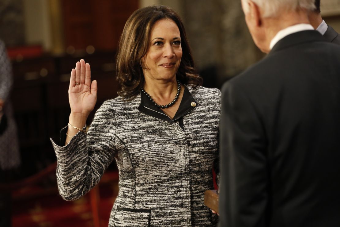 Sen. Kamala Harris participates in a reenacted swearing-in with U.S. Vice President Joe Biden in the Old Senate Chamber at the U.S. Capitol on January 3, 2017 in Washington, DC.