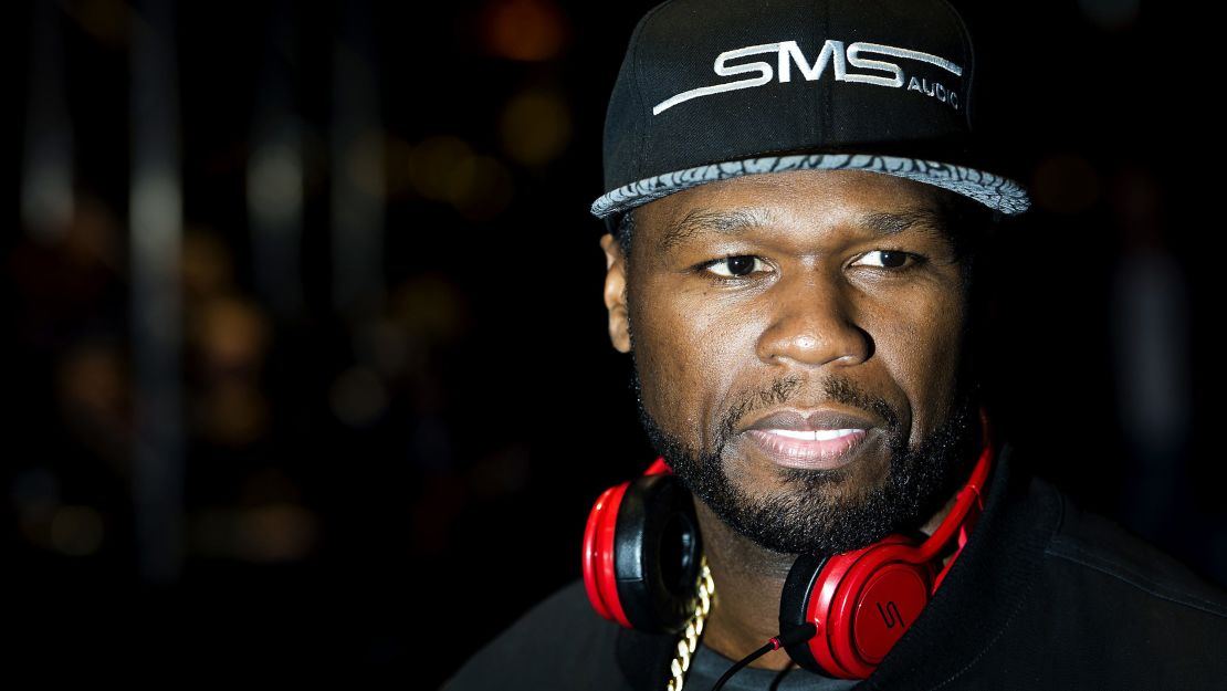 50 Cent smiles during the 2014 release party of his new headphones in Amsterdam.