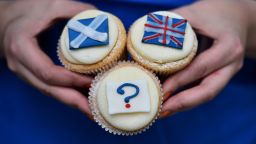 'Referendum cupcakes' featuring a Scottish Saltire, (L) a Union flag (R) and a question mark (Below) symbolising the 'undecided voter' are pictured at a bakery in Edinburgh, Scotland, on September 16, 2014, ahead of the referendum on Scotland's independence. The leaders of the three main British parties on Tuesday issued a joint pledge to give the Scottish parliament more powers if voters reject independence, in a final drive to stop the United Kingdom splitting.  AFP PHOTO / BEN STANSALL        (Photo credit should read BEN STANSALL/AFP/Getty Images)