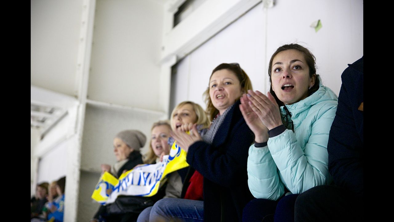 Fans cheer at the Ice Arena in Kiev.