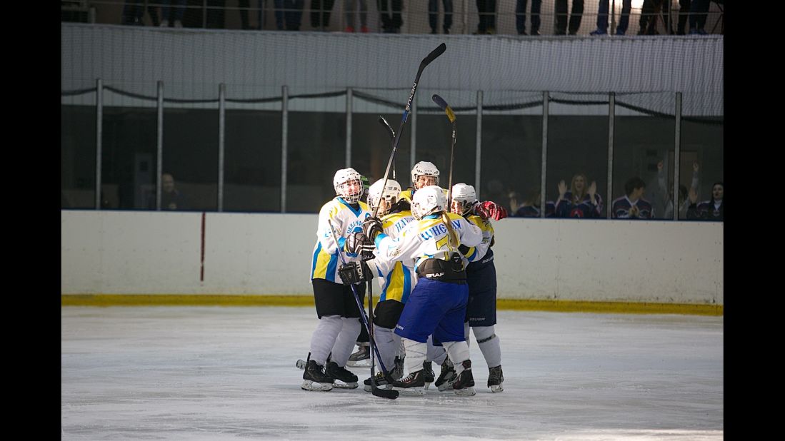 The tournament also hoped to transcend the economic and political turmoil afflicting Ukraine with the war going on in the east of the country. Here, Kyiv Ukrainochka players celebrate a goal.