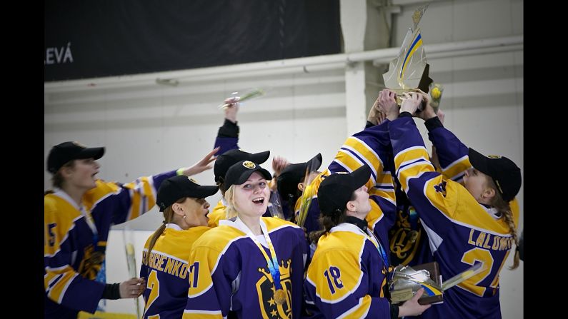 The Dnipro Queens celebrate winning the overall competition.