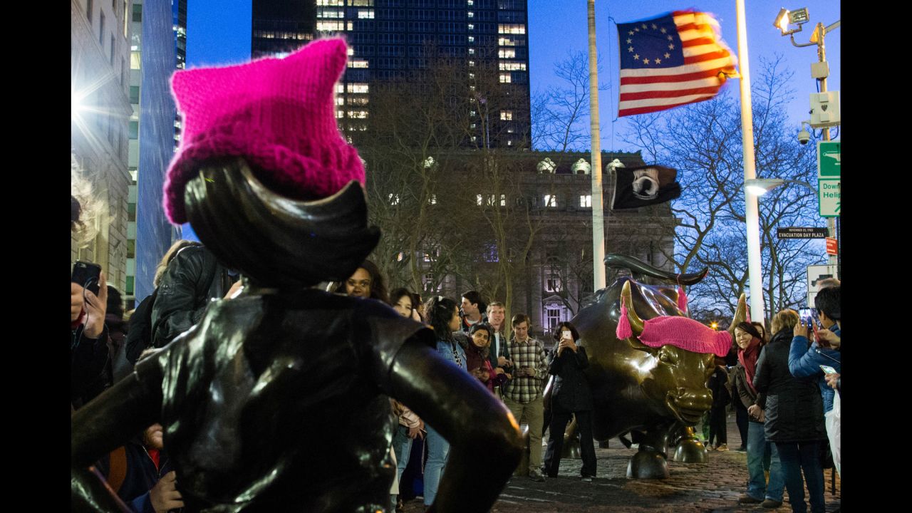 A pink "<a href="http://www.cnn.com/2017/01/20/politics/pussyhat-project-washington-march-trnd/">Pussyhat</a>" adorns the "Fearless Girl" statue, which was installed a day before International Women's Day, when women took to the streets to march in "A Day Without a Woman" events.