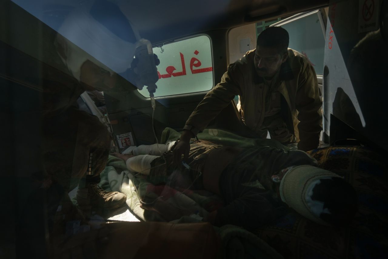 Soldiers wounded in the fight against ISIS are evacuated in an ambulance to a hospital in Mosul on the south-west front.