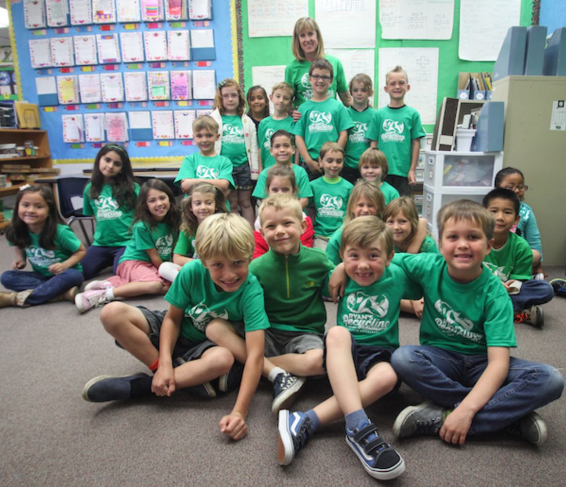 Ryan and his classmates with Ryan's Recycling Company T-shirts.